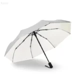 Parapluie anti-UV coloré et design, ouvert, structure noire élégante, parfait pour se protéger du soleil et des intempéries.