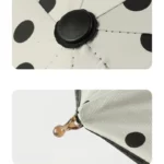 Parapluie anti-UV pliant à pois noirs et blancs, compact, élégant, protection solaire et pratique pour toutes saisons.