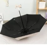 Parapluie automatique fleuri, élégant avec motif floral, structure noire et nœud décoratif sur le manche, [Collection].