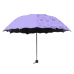 Parapluie femme coloré avec motifs floraux, élégant et pratique pour une protection stylée contre la pluie, parfait pour toutes saisons.
