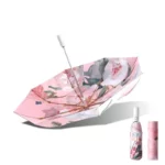 Parapluie femme vintage rose avec motif floral, élégant et pratique, parfait pour ajouter une touche rétro à vos journées pluvieuses.
