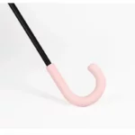 Parapluie avec motifs de notes de musique, poignée rose élégante, idéal pour les mélomanes et amateurs d'accessoires stylés.