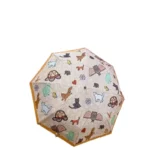 Parapluie pliant chat avec motifs d'animaux amusants (tortues, chats, chiens, fleurs) sur fond beige - idéal pour un look original.