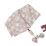 Parapluie pliant fleuri avec motif floral rose, élégant et pratique, idéal pour la pluie, inclus étui assorti et nœud décoratif.