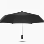 Parapluie tempête automatique noir, design élégant et robuste, parfait pour affronter la pluie avec style et durabilité.