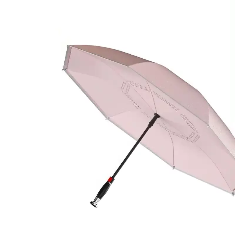 Parapluie tempête double couche rose, transparent, élégant et design, avec poignée noire idéal pour se protéger de la pluie.