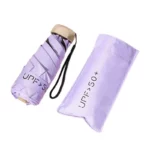 Mini parapluie léger violet, pliable, protection UPF 50+, compact et pratique, avec étui de rangement élégant pour tous les temps.