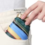 Mini parapluie vintage pliable, compact 4 cm, facile à ranger dans une poche, parfait pour un transport pratique au quotidien.