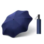 Parapluie anti UV bleu marine original, design ondulé, pliable et compact, élégant et pratique pour une protection optimale.