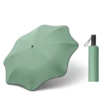 Parapluie anti-UV original vert en forme de fleur, élégant et pratique, parfait pour protéger du soleil et de la pluie.