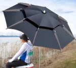 Parapluie de pêche réglable offrant une protection idéale contre le soleil, parfait pour les pêcheurs et activités en plein air.