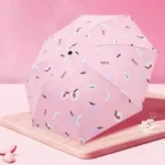 Parapluie enfant rose motif pêches, accessoire ludique et coloré pour la pluie. Design unique de la collection [Collection].