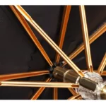 Parapluie homme élégant avec poignée argentée, structure robuste, baleines dorées et revêtement noir raffiné, [Collection].