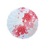 Parapluie japonais traditionnel en papier huilé, motifs floraux rouges, authentique et élégant, parfait pour un style unique.