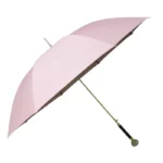 Parapluie luxe avec poignée ornée de strass, design élégant rose et doré, accessoire chic pour se protéger de la pluie.