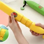 Parapluie pliable original en forme de banane jaune, design fun et pratique, accessoire coloré parfait contre la pluie.