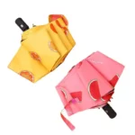 Parapluies originaux avec motifs fruits : orange et pastèque, design coloré pour allier style et protection contre la pluie.