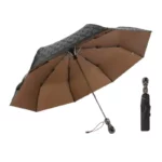 Parapluie tête de mort original, design noir et brun, élégant et compact, avec housse incluse, parfait pour un style unique.