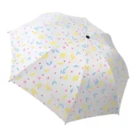 Parapluie pliant fleuri avec motifs floraux colorés, compact et élégant, parfait pour rester chic sous la pluie.