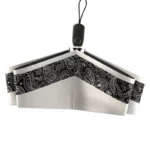 Parapluie pliant élégant avec motif paisley noir et blanc, parfait pour un style chic et une protection efficace contre la pluie.