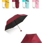 Petit parapluie capsule pliable rouge et noir, design compact et coloré, idéal pour une protection élégante contre la pluie.