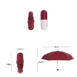 Parapluie pliable rouge en capsule, compact 18 cm replié, 85 cm déployé, pratique et élégant pour une protection contre la pluie.