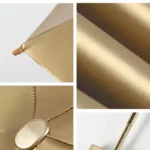 Petit parapluie chic doré avec design élégant, détails raffinés de la texture, pointe stylée et système d'ouverture sophistiqué.