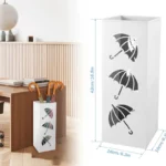 Support parapluies en métal blanc, design élégant avec motifs d'ombrelles, parfait pour un intérieur moderne et fonctionnel.