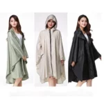 Poncho femme zip imperméable en vert, beige et noir avec capuche, coupe ample, idéal pour la pluie et le style moderne.