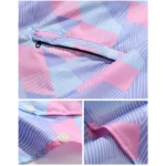 Poncho femme respirant coloré avec motifs géométriques rose et bleu, fermeture éclair, coutures soignées, tendance et pratique.