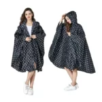 Poncho femme imperméable noir à pois blancs pour randonnée, élégant et pratique avec capuche pour protection contre la pluie.