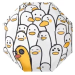 Parapluie rigolo avec motif de canards blancs et un canard jaune à lunettes de soleil, parfait pour illuminer les jours de pluie.