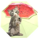 Parapluie anti-UV avec motif chaton et pastèque, design fun et coloré, idéal pour une protection stylée contre la pluie et le soleil.