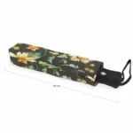 Parapluie automatique de poche pliant, motif floral coloré sur fond noir, compact et pratique, longueur repliée de 28 cm.