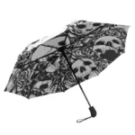Parapluie automatique solide avec motifs crânes et roses, élégant et pratique, parfait pour un style unique sous la pluie.