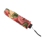 Parapluie automatique pliable tête de mort avec motif floral de roses et housse, alliant style audacieux et protection contre la pluie.