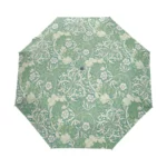 Parapluie femme anti-UV motif floral, élégant et pratique, accessoire parfait pour protection et style par temps pluvieux.
