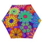 Parapluie femme coloré avec motifs floraux vibrants sur fond violet, parfait pour illuminer les jours de pluie avec style et élégance.