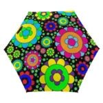 Parapluie femme élégant avec motifs floraux colorés sur fond noir, idéal pour ajouter une touche vibrante à vos journées de pluie.