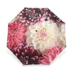 Parapluie femme avec motif floral dégradé rose et blanc, élégant et coloré, idéal pour rester stylée tout en se protégeant de la pluie.