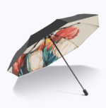 Parapluie femme tulipe élégant, motif floral rouge et blanc, léger et stylé, idéal pour se protéger de la pluie avec charme.