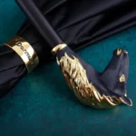 Parapluie homme luxe noir avec poignée tête de lion dorée, design élégant et raffiné pour un style sophistiqué.