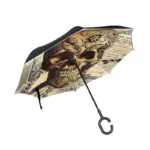 Parapluie inversé double couche avec design crâne et motifs floraux vintage, alliage de style et protection contre la pluie.