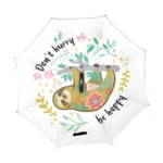 Parapluie inversé décoré avec un paresseux et le message Don't hurry, be happy, motif floral, résistant et joyeux pour la pluie.