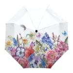 Parapluie transparent à motifs floraux colorés avec roses et papillons, alliant élégance naturelle et protection contre la pluie.