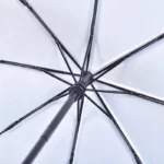 Parapluie original motifs glaces, structure métal noir robuste, design unique pour un style fun et tendance, idéal pour toutes saisons.