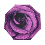 Parapluie pliable original avec motif rose violette et gouttes d'eau, élégant et pratique pour rester protégé sous la pluie.