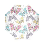 Parapluie pliant 3 plis, design octogonal avec motifs papillons et fleurs colorés, élégant et pratique pour rester au sec avec style.