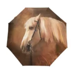 Parapluie pliant cheval avec illustration artistique, crins blonds, fond teintes chaudes, accessoire élégant pour la pluie.