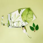 Parapluie pliant chic avec motif de feuilles vertes, élégant et pratique, parfait pour compléter votre style sous la pluie.